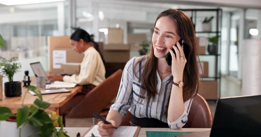 Phone call, shipping and checklist with business woman in office for courier delivery, logistics schedule and inventory.