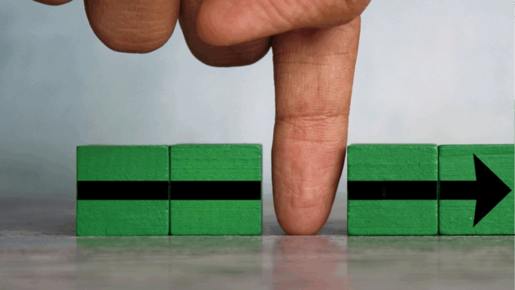 A finger directs the path forward, representing overcoming bureaucracy and moving in a more efficient direction.