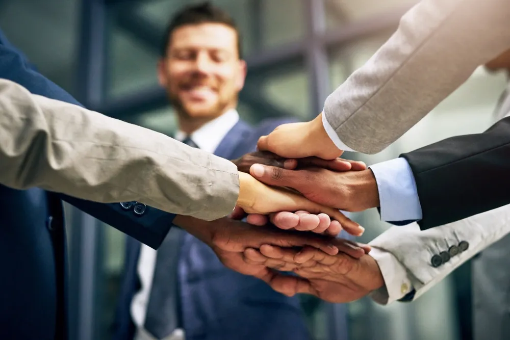 Hands and collaboration of team with support, celebration and corporate success.