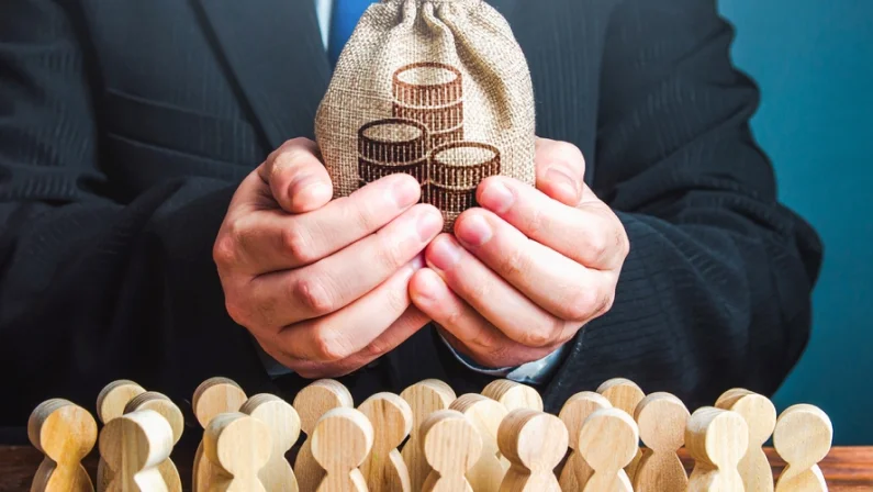 Businessman holds out a money bag to the crowd. Official. Staff maintenance. Tax collection. Compensation payments. Share profit. Providing money, paying salaries and grants. Financial support.
