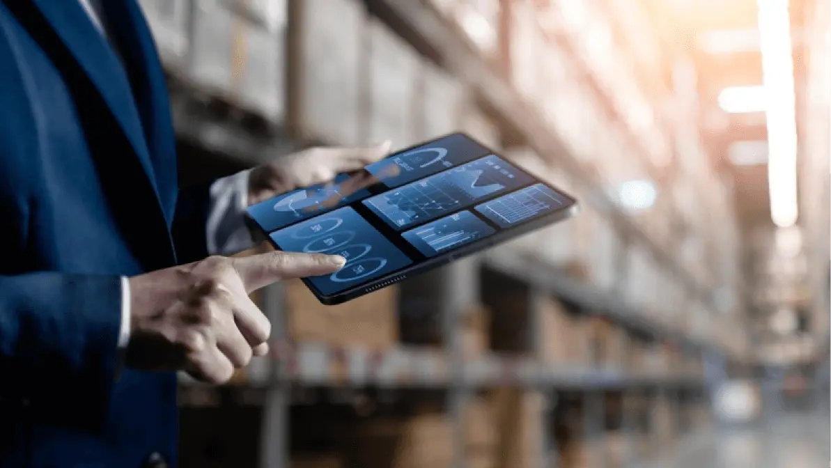 Close up, Woman worker or supervisor uses a digital tablet to check the stock inventory, a Smart warehouse management system, supply chain and logistic network technology concept.