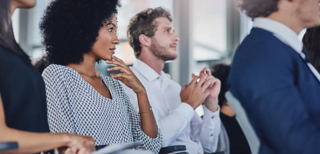 Event, development and seminar with business people in conference room for learning or training. Corporate, education or workshop with man and woman employee group in audience or crowd at office